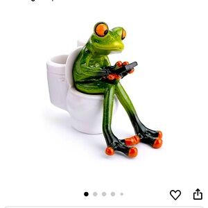 Green Frog Figurine on Toilet